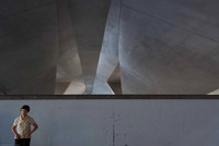 Woman exercising under the Esplanade Bridge